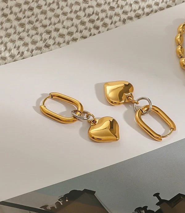 Gold Oval Hoop Earrings with Puffed Heart Charms