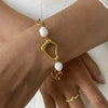 Faye Pearl and Gold Abstract Link Bracelet
